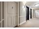 Hallway with unit doors, black elevators, and carpeting at 909 N Logan St # 10C, Denver, CO 80203
