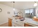 The kitchen offers generous counter space and a stove top, great for cooking and entertaining at 909 N Logan St # 10C, Denver, CO 80203