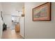 Kitchenette area featuring tile floors and a door to an exterior balcony at 909 N Logan St # 10C, Denver, CO 80203
