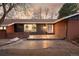 Charming single-story home with a well-manicured front yard and inviting entryway at 7382 W Stanford Ave, Littleton, CO 80123