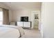Primary bedroom with a modern dresser, walk-in closet, and balcony access at 2320 N Lafayette St, Denver, CO 80205