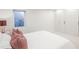 Bedroom featuring built-in cabinets and a window with light at 2320 N Lafayette St, Denver, CO 80205