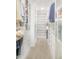 Spacious walk-in closet with custom shelving and ample storage space at 2320 N Lafayette St, Denver, CO 80205