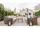 Outdoor patio with comfortable seating, umbrellas, and stylish decor, creating an inviting space for relaxation at 2320 N Lafayette St, Denver, CO 80205