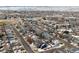 Wide aerial view of neighborhood including community pool at 9790 Moss Rose Cir, Highlands Ranch, CO 80129