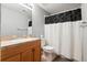 Clean basement bathroom with shower/tub combo at 9790 Moss Rose Cir, Highlands Ranch, CO 80129