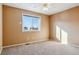 Bedroom with neutral walls and carpet at 9790 Moss Rose Cir, Highlands Ranch, CO 80129