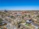 Aerial view of neighborhood highlighting the property's location, mature trees, and proximity to shops and schools at 2732 S Jackson St, Denver, CO 80210