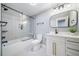 Modern bathroom featuring a walk-in shower, sleek vanity, and contemporary fixtures at 2732 S Jackson St, Denver, CO 80210