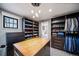 Custom walk-in closet with a center island, shoe shelves and generous storage space at 2732 S Jackson St, Denver, CO 80210