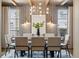 Dining room with modern chandelier and wallpaper at 1050 S Gilpin St, Denver, CO 80209
