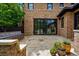An inviting stone patio provides an outdoor living space at 1050 S Gilpin St, Denver, CO 80209