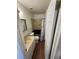 Bathroom with vanity sink, toilet, and walk-in shower with curtain at 2241 Dexter Dr # 2, Longmont, CO 80501