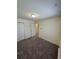 Standard bedroom with a double door closet, neutral carpet and paint at 2241 Dexter Dr # 2, Longmont, CO 80501