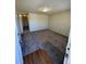 A spacious living room with new carpet and view to interior hallway at 2241 Dexter Dr # 2, Longmont, CO 80501