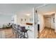 Contemporary bar area with sleek countertops, modern bar stools, and stylish decor in an open-concept space at 1085 N Lafayette St # 804, Denver, CO 80218