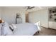 Bright bedroom featuring a ceiling fan, closet space, and a neutral color palette at 1085 N Lafayette St # 804, Denver, CO 80218