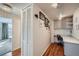 Comfortable home office nook featuring hardwood floors, built-in cabinets, and a built-in desk with a marble countertop at 1085 N Lafayette St # 804, Denver, CO 80218
