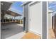 The backyard features a modern shed for storage, as well as a new patio area with a sunshade at 2452 S Norfolk St, Aurora, CO 80013