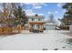 Wide backyard showcasing a pergola with seating, a barbecue grill, and a well-maintained lawn at 17794 E Bellewood Dr, Aurora, CO 80015