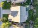 Aerial view of the well-maintained house, gray roof, and manicured backyard at 9294 Melborne Ct, Parker, CO 80134