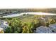 Gorgeous aerial view of the community pond and park; a peaceful neighborhood setting at 9294 Melborne Ct, Parker, CO 80134