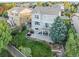 The beautiful backyard has a stone patio, lovely landscaping, and a charming two-story home at 9294 Melborne Ct, Parker, CO 80134
