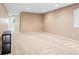 Spacious basement area with neutral carpet and recessed lighting offers potential for flexible use at 9294 Melborne Ct, Parker, CO 80134