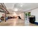 Unfinished basement with a walkout to the yard and storage areas at 2959 W 110Th Pl, Westminster, CO 80234