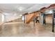 Unfinished basement with exposed ducts, concrete floor, and stairs at 2959 W 110Th Pl, Westminster, CO 80234