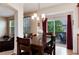 Adjacent to the living room, the dining room boasts natural light and access to the outdoors at 2959 W 110Th Pl, Westminster, CO 80234