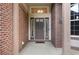 Close up of the front door with brick columns, transom window, and sidelights at 2959 W 110Th Pl, Westminster, CO 80234