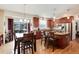 This open concept kitchen features a seamless transition into the dining area and living space at 2959 W 110Th Pl, Westminster, CO 80234