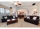 Spacious living room showcasing an open floor plan leading to the kitchen area at 2959 W 110Th Pl, Westminster, CO 80234