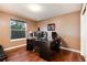 Functional home office with hardwood flooring, natural light, and plenty of workspace at 2959 W 110Th Pl, Westminster, CO 80234