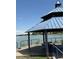 Picturesque gazebo overlooking a tranquil lake, offering a perfect spot for relaxation at 7978 Chase Cir # E, Arvada, CO 80003