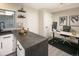 Bright kitchen with sleek countertops and an adjacent workspace, ideal for modern living at 7978 Chase Cir # E, Arvada, CO 80003