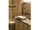 Updated bathroom with ceramic tiling, vanity and marble sink at 2301 E Fremont Ave # W02, Centennial, CO 80122