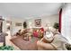 Welcoming living room featuring comfortable furniture, a decorative area rug, and plenty of space for relaxing or entertaining at 2301 E Fremont Ave # W02, Centennial, CO 80122