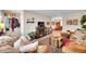 Comfortable living room with fireplace, plush seating, and open floorplan for a welcoming and spacious atmosphere at 2301 E Fremont Ave # W02, Centennial, CO 80122