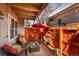 Charming patio with comfortable seating, bright accents, and an inviting atmosphere for outdoor relaxation and enjoyment at 2301 E Fremont Ave # W02, Centennial, CO 80122