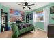 The bedroom is decorated with a Japan theme and has a ceiling fan at 6280 Snowberry Ave, Firestone, CO 80504