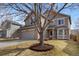 Charming two-story home features a well-maintained front yard and attached two-car garage at 6280 Snowberry Ave, Firestone, CO 80504