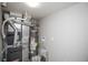 Functional utility room equipped with modern HVAC system, water heater, and ample space at 15045 E Louisiana Dr # B, Aurora, CO 80012