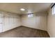 Finished basement with ample storage shelving at 2415 E Maplewood Ave, Centennial, CO 80121