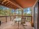 Enjoy the beautiful scenery from this covered back deck with comfortable outdoor seating at 23485 Bluestem Dr, Golden, CO 80401