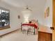 Cozy bedroom with ample natural light, ceiling fan, and complementary furnishings at 23485 Bluestem Dr, Golden, CO 80401