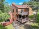 Exterior showcasing multiple decks, wood siding, and a fenced area at 23485 Bluestem Dr, Golden, CO 80401
