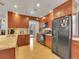 Well-lit kitchen with stainless steel appliances, granite countertops, and ample cabinet space at 23485 Bluestem Dr, Golden, CO 80401