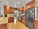 Functional kitchen with granite counters, stainless steel appliances and light wooden floors at 23485 Bluestem Dr, Golden, CO 80401